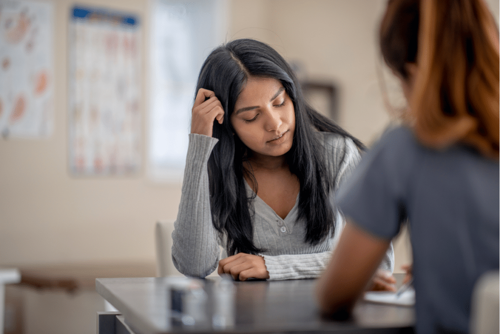 a mom talking to her daughter about using social media