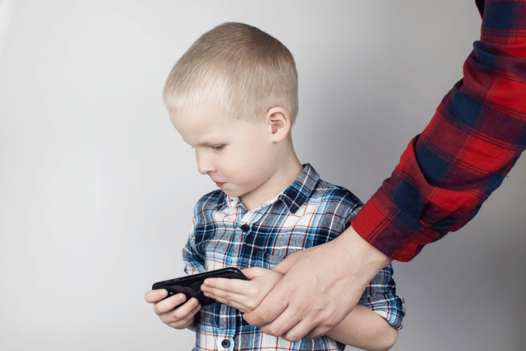 Parent taking phone away from child