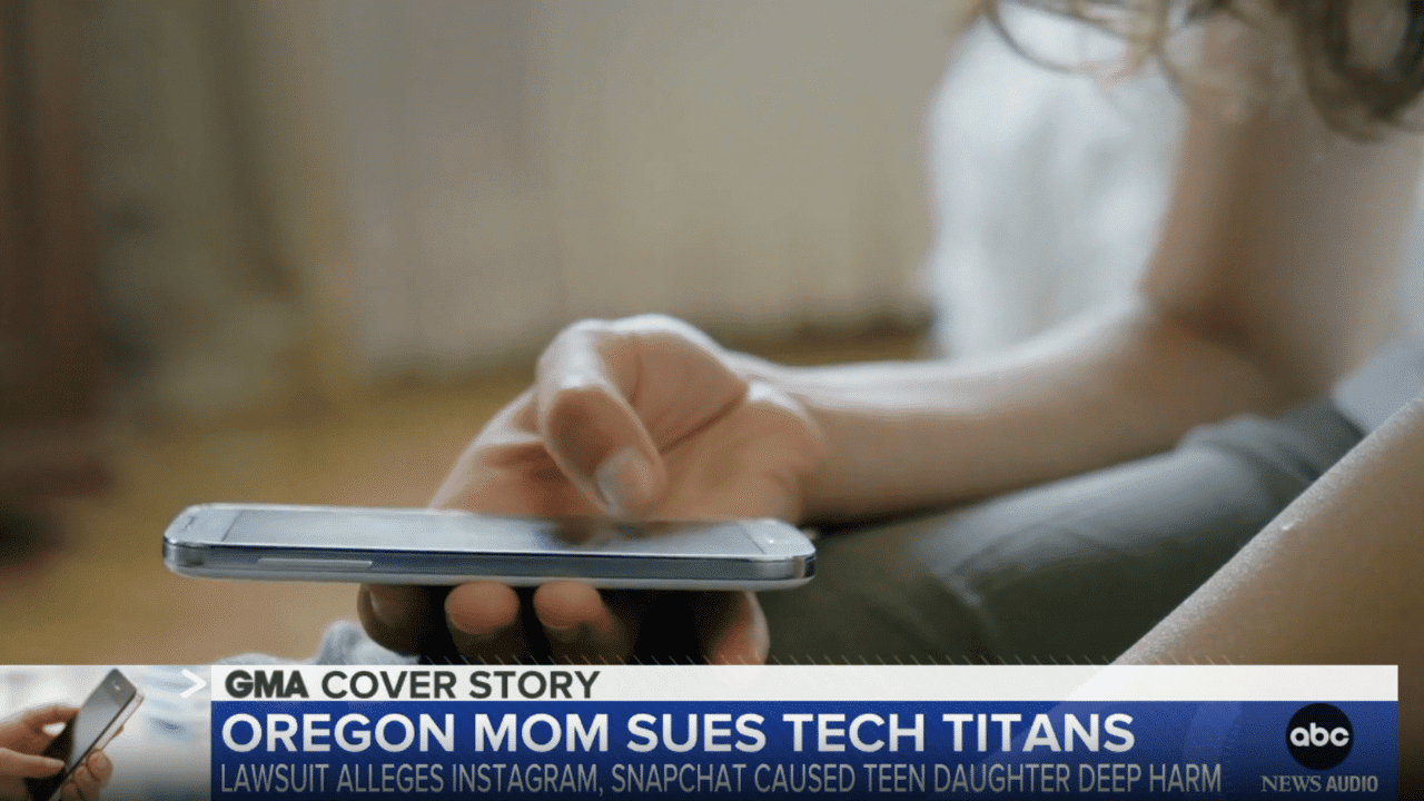 a teen using a phone on news coverage of an Oregon Mom suing tech companies