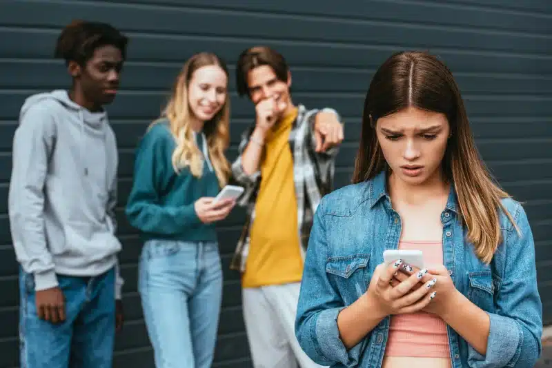 a girl being bullied on social media