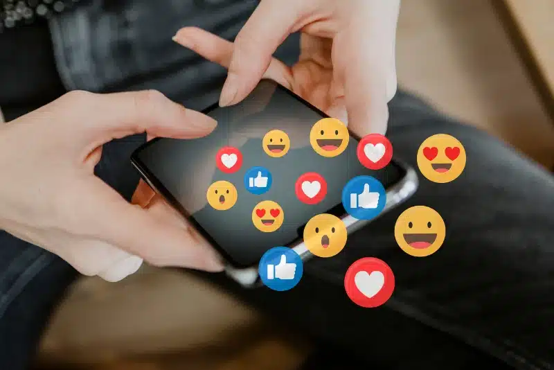 a girl scrolling on social media on her phone