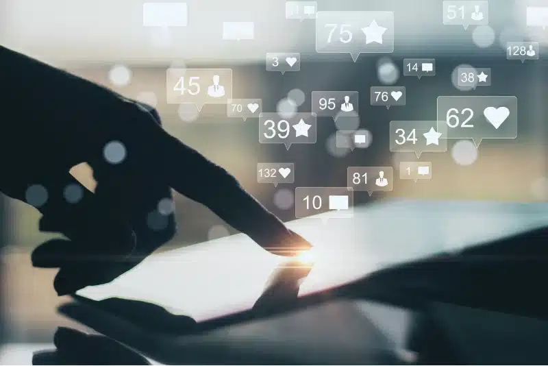 a photo of a hand scrolling on social media