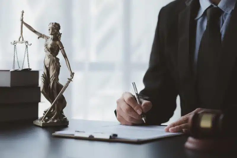 lawyer writing on paper