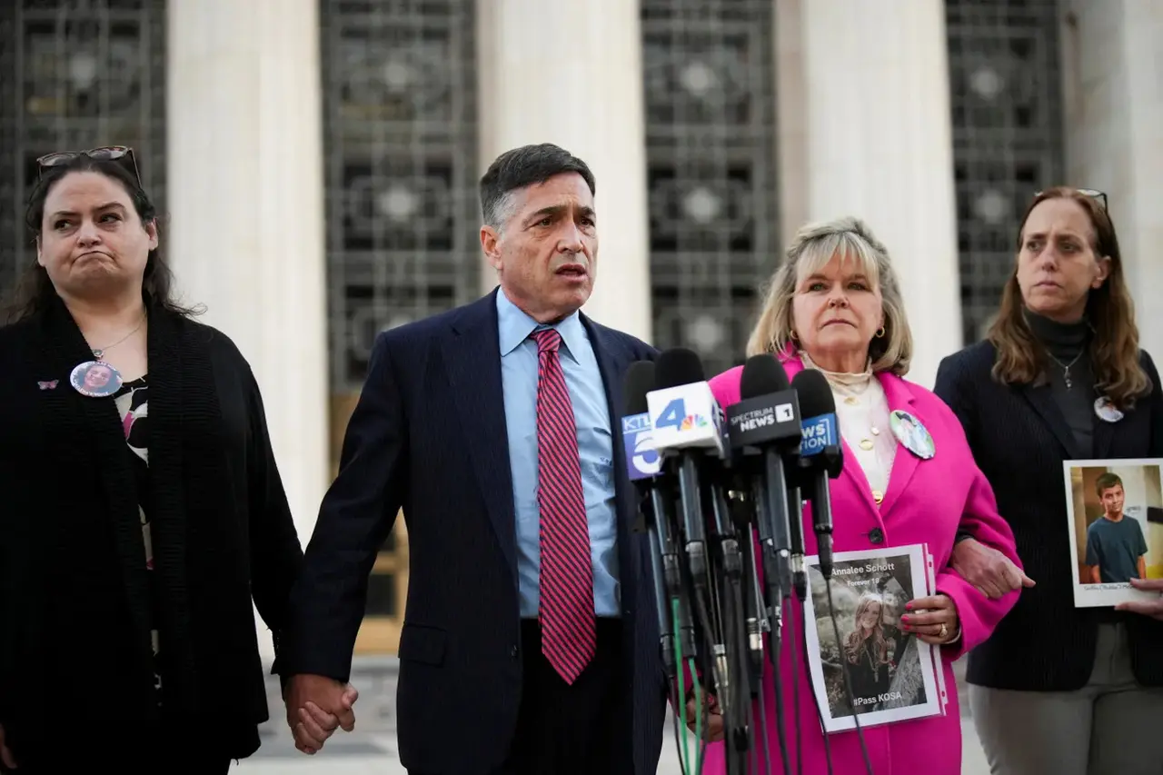 Attorney Matthew P. Bergman holding hands with parents of victims outside courthouse in Los Angeles at KGM trial
