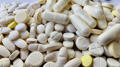 a pile of counterfeit pills bought second hand